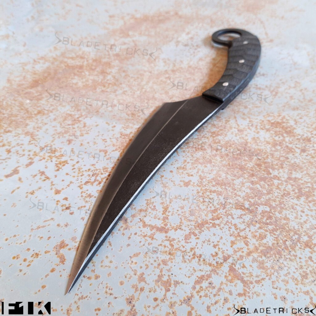 Bladetricks F1K black G10 karambit with integral steel ring